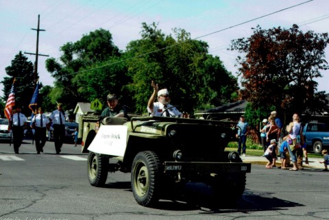 Eugene Brick riding with District Commander Floyd Leach in Ken Bicart's WWII jeep